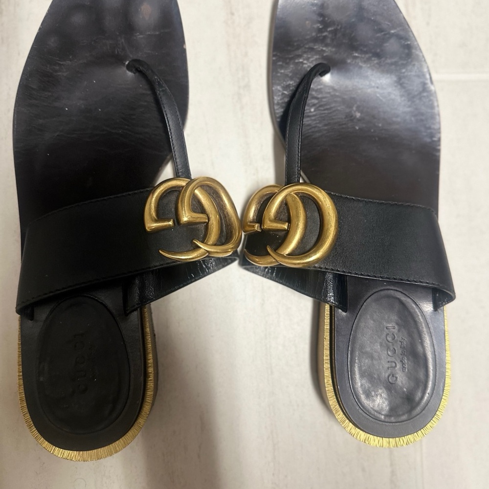 Gucci Black and Gold Sandals with Luxurious Accents